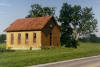 In rural rectangular Ohio, the one-room schoolhouse was ideally at the center of four square-mile sections of land.  This structure east of Williamstown was built in 1880.